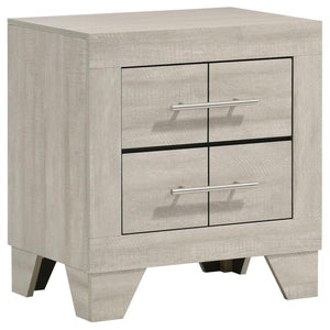 This contemporary two-drawer nightstand brings a chic blend of rustic and modern design to your bedside. Crafted with a rustic cream finish over rough-sawn, white-washed engineered paper veneer, it exudes a warm, textured appeal. Extra-wide polished nicke