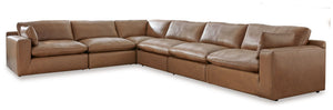 Catering to your contemporary lifestyle, this sectional is a handsome marriage of masculine and feminine sensibilities. Feather-fiber cushions and bolster pillows soften the look of its chunky, linear silhouette. A warmly hued combination of leather and f
