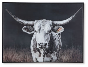 Add homespun charm to modern farmhouse and casual spaces. A longhorn cow takes center stage in this wall art, its white coat contrasting beautifully against the dark background tones. A sleek black frame completes the look.<br/><br/><b>Product Features</b