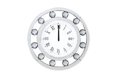 Time to shine with the Boffa mirrored wall clock. This clock features a circular floating crystal balls and beveled mirror frame. The clock face has a clean, modern look featuring roman numerals. Its casual yet elegant look will become the most stunning d