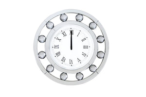 Time to shine with the Boffa mirrored wall clock. This clock features a circular floating crystal balls and beveled mirror frame. The clock face has a clean, modern look featuring roman numerals. Its casual yet elegant look will become the most stunning d