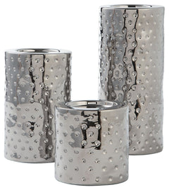 Take a stance for shapely style. Crafted of a glazed ceramic, this candle holder set shine with simply striking design and contemporary flair.<br><br><b>Additional Dimensions</b><br><ul><li>Candle holder-small: 0-"</li><li>Candle holder-medium: 0-"</li><l