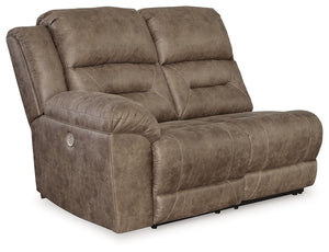 This left-arm facing power reclining loveseat is made with faux leather upholstery. Pairs with other items in the series to make a sectional.<br><br><b>Additional Dimensions</b><br><ul><li>Arm height: 27-"</li><li>Seat depth: 22-"</li><li>Seat height: 20-