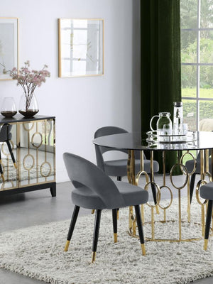  featuring an elegant bucket-style seat that embodies Mid-Century modern charm. Wrapped in luxurious velvet