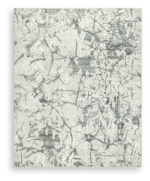 Make a statement that effortlessly complements your modern sensibilities. This rug adds an intentionally curated feel underfoot, with versatile shades of gray forming an intriguing abstract design. Crafted with comfort and convenience in mind, this soft f