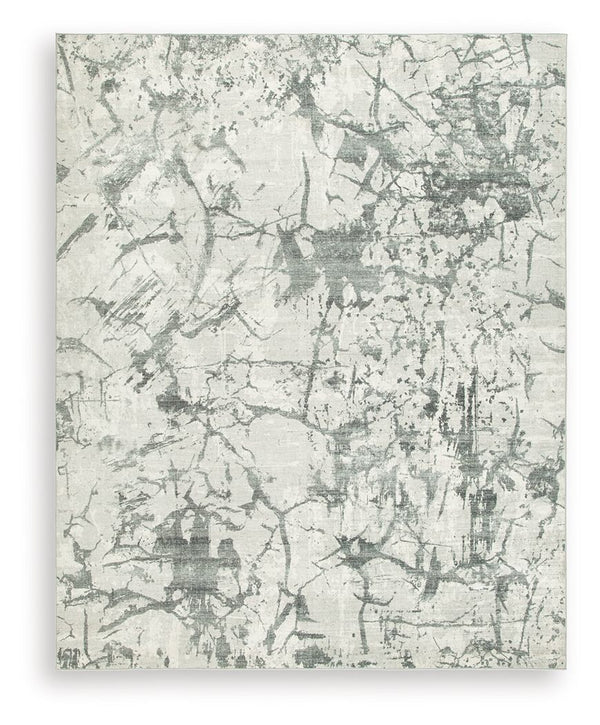 Make a statement that effortlessly complements your modern sensibilities. This rug adds an intentionally curated feel underfoot, with versatile shades of gray forming an intriguing abstract design. Crafted with comfort and convenience in mind, this soft f