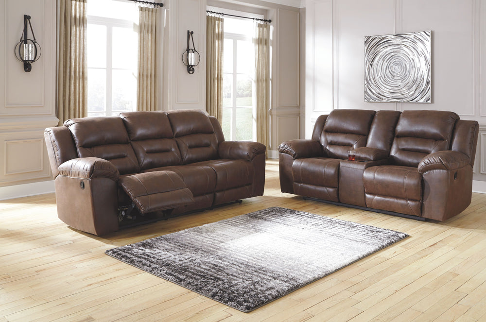 For those that love the cool look of leather but long for the warm feel of fabric, this reclining set delivers both with ease. Its high-performance padded faux leather is remarkably durable and easy to clean, just the thing for family spaces. Channel-stit