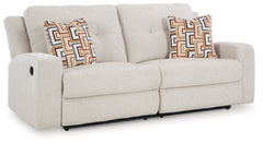 This reclining sofa invites you to a luxuriously soft lounging experience. The chic hue fits right in with contemporary color palettes. A tufted back keeps the look right on trend. Balancing style and function, its pull tab reclining effortlessly takes yo