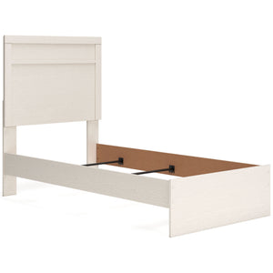 white hue over subtle replicated wood grain easily complements other furniture finishes. Its simple
