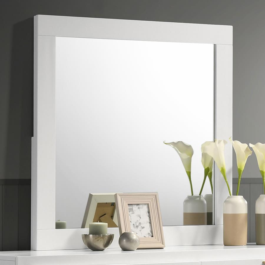 Modern luxury with a minimalist look offers a perfect fit for updated bedrooms as the dresser mirror completes an ensemble with utility and beauty in a sleek master suite or guest bedroom. Wood and wood products construct a mirror frame with clean lines a