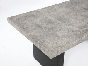  concrete-inspired tabletop and sleek black supports