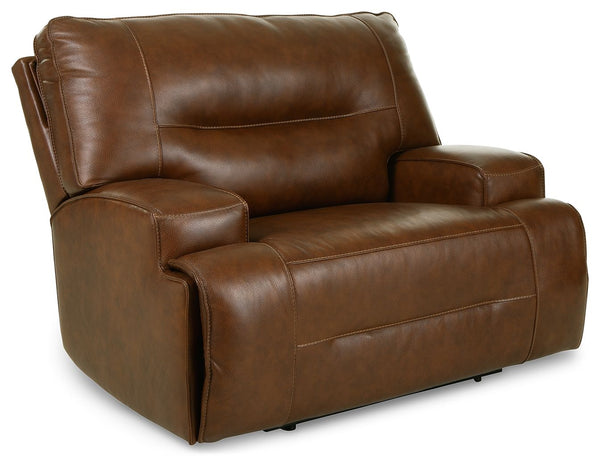 Master statement-making contemporary comfort with this power recliner. It displays a striking yet streamlined profile, with expertly matched leather and faux leather upholstery in an auburn hue balancing natural beauty and refined design. An adjustable he