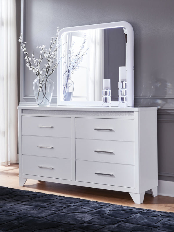  bringing a touch of modern glamour to your sanctuary. A sleek white finish and inset glitter accents create a luxurious feel