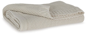 Your place is that much more relaxed and inviting with this cozy throw. Crafted with supreme softness in mind, its neutral hue pairs with a variety of decor. Whether this throw is at the foot of the bed or on the arm of your favorite chair, it-'s wonderfu