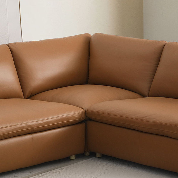 The Brighton sectional sofa exudes contemporary elegance and comfort. Covered in brown top grain leather, this spacious sectional is perfect for family gatherings or cozy evenings at home. Its sleek design and plush cushions offer both style and relaxatio
