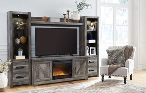 This entertainment center with fireplace insert is sure to win your heart with its daring designer take on modern rustic. Its crisp, clean and minimalist-chic profile is enriched with a striking replicated oak grain with thick plank styling and a weathere