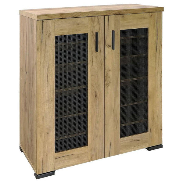This shoe cabinet blends functional storage with a warm, rustic aesthetic. Crafted from engineered wood with a golden oak wood-look laminate veneer, it offers a natural texture that complements a variety of interiors. The double doors feature mesh-style i