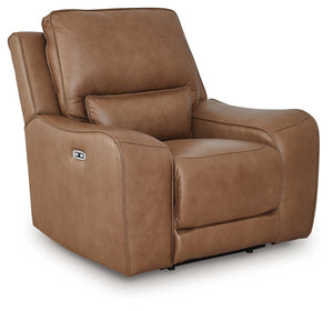 Live and lounge luxuriously. This power recliner brings an ultra-stylish flair to your homeâ€™s central hub. Its seating area is wrapped in top-grain leather in a rich caramel coloration, giving you a trend-right look made all the better with high-quality