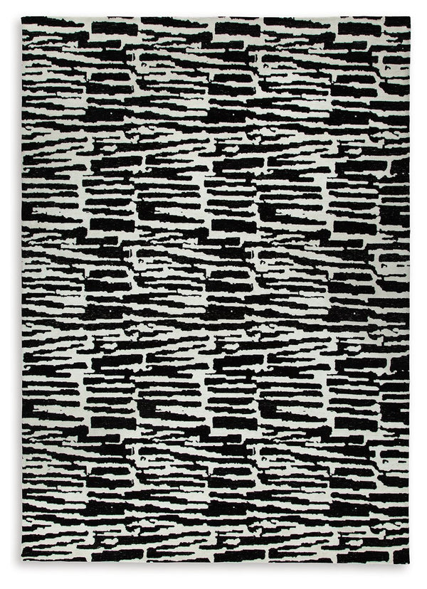 Revitalize your decor with this captivating rug. Infusing your surroundings with style, its abstract motif and rich neutral colors create the perfect pop of interest.<br/><br/><b>Product Features</b><ul><li>Made of polyester</li><li>Machine woven</li><li>