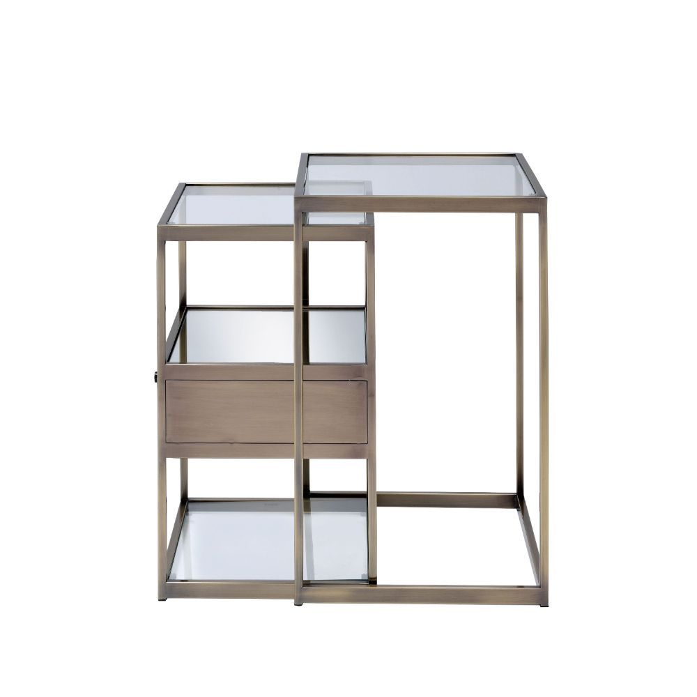 Create double the end table space with the contemporary Enca two-piece nesting tables. This trendy antique brass with clear glass set can be used next to each other in a stepped pattern to produce a beautiful showcase or used separately in different areas