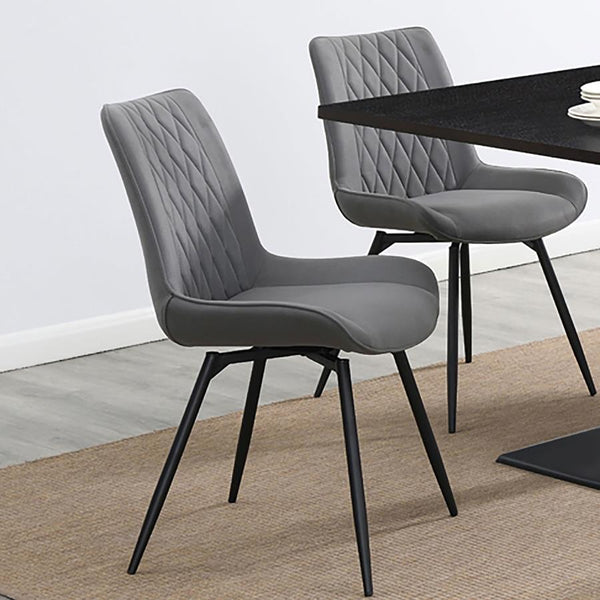  this swivel dining chair blends retro-inspired charm with modern comfort. Wrapped in plush fabric upholstery
