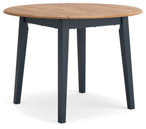 Complement your homeâ€™s simply relaxed sensibility with this drop-leaf dining table. A dark blue hue offers a chic contrast to the natural wood tone, for a casual look that vibes with a variety of aesthetics. When guests drop by, convert it from a space-