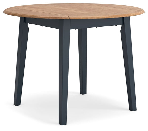 Complement your homeâ€™s simply relaxed sensibility with this drop-leaf dining table. A dark blue hue offers a chic contrast to the natural wood tone, for a casual look that vibes with a variety of aesthetics. When guests drop by, convert it from a space-