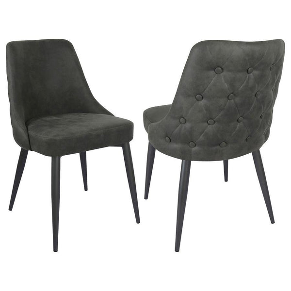 Blending mid-century inspiration with classic charm, this dining side chair is a stylish and versatile addition to any dining space. The gently curved backrest features elegant button tufting on the exterior and a smooth, cushioned interior for a refined 