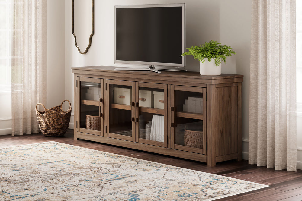 Elevate your entertainment experience with this TV stand. A functional focal point for your living room, itâ€™s defined by a richly versatile finish. Instantly upgrade game days and movie nightsâ€”the large-scale silhouette easily hosts flat screens. And 