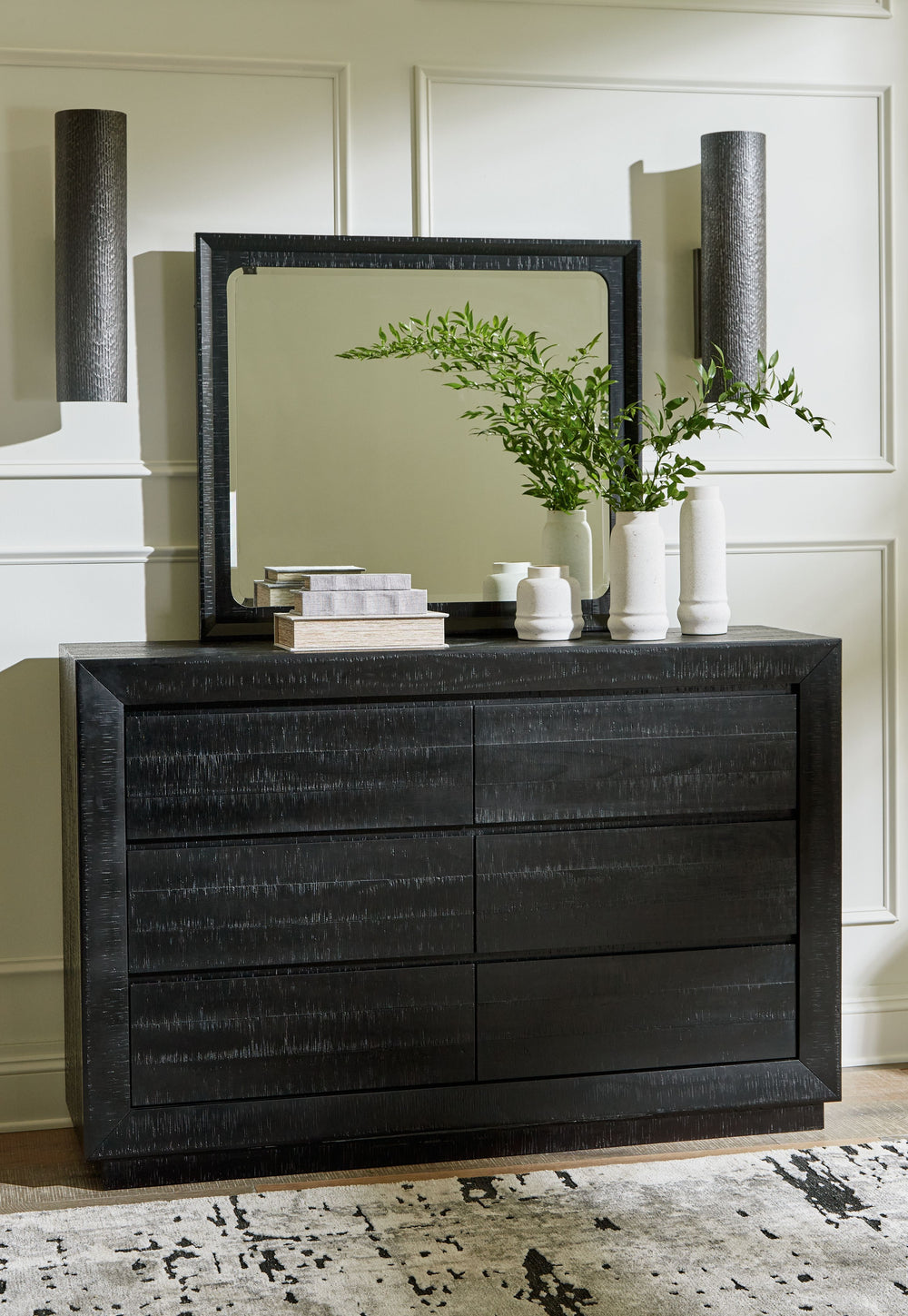 The heavily distressed surface of this dresser with mirror reflects balance between farmhouse and contemporary style. With streamlined storage and a timeless design thatâ€™s equal parts cool and casual, it offers uncomplicated sophistication with a modern
