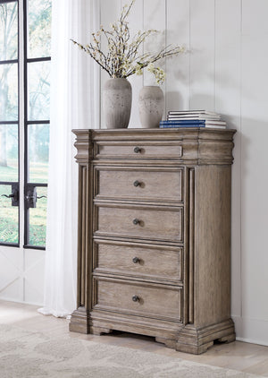  embodied by classic-inspired columns and a relaxed grayish brown finish. Casually cool drawers with inset framed fronts are packed 