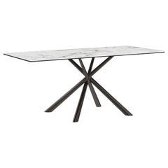 Gorgeous sintered stone brings depth and dimensionality to a modern rectangular dining table. A true centerpiece in your kitchen or dining room, it boasts an enchanting white mirage finish on its table top, offering multi-tonal allure with a hint of glam.