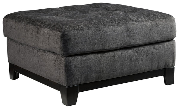 Stealing the show in a steel gray upholstery that-'s wonderfully plush and so on trend, this oversized ottoman takes center stage when it comes to comfort and contemporary style. Exposed feet with a faux wood finish complete the look.<br><br><b>Additional