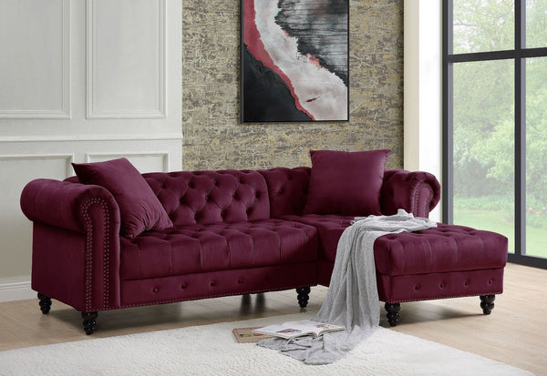 Create a chic living room with the Adnelis sectional sofa. It is beautifully upholstered in lustrous velvet. It is designed with spectacular attention to fine details such as button tufting and nail-head trim accents. The rolled armrests add a regal touch