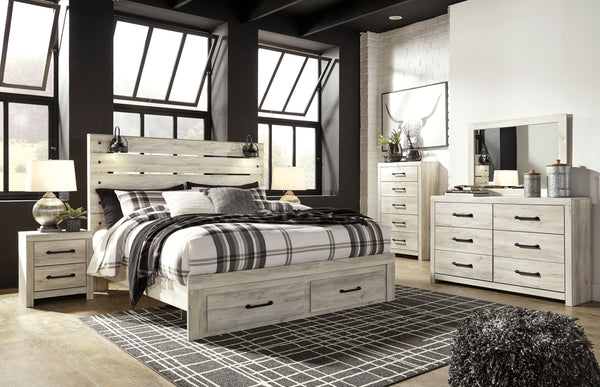 Wispy white finish over replicated Oak grain with authentic touch. Large scaled dark colored handles. Cases feature a framed front and pilasters. All panel headboards (53,57,58,87) feature decorative matte black sconce lights. Side roller glides for smoot