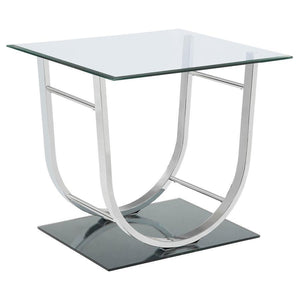 This modern square end table combines a clear tempered glass top with a sleek mirrored base, creating a visually striking design. The curved electroplated heavy gauge metal frame in a polished chrome finish adds elegance and stability. Crafted for durabil
