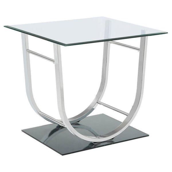 This modern square end table combines a clear tempered glass top with a sleek mirrored base, creating a visually striking design. The curved electroplated heavy gauge metal frame in a polished chrome finish adds elegance and stability. Crafted for durabil