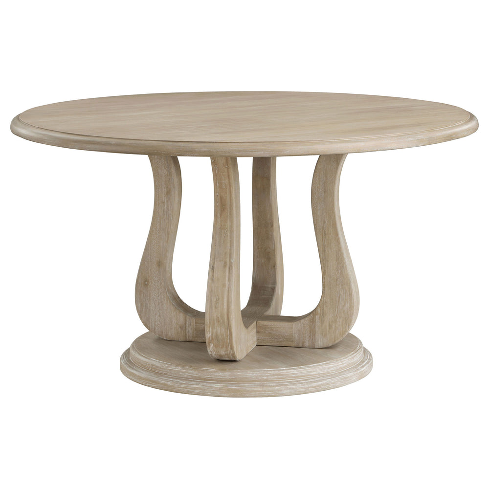 Design your inviting dining space around this modern farmhouse round dining table. Its welcoming ambiance is encouraged with its silhouette, creating a perfect spot for family dinners and easy-going conversation. The table features a decorative base with 