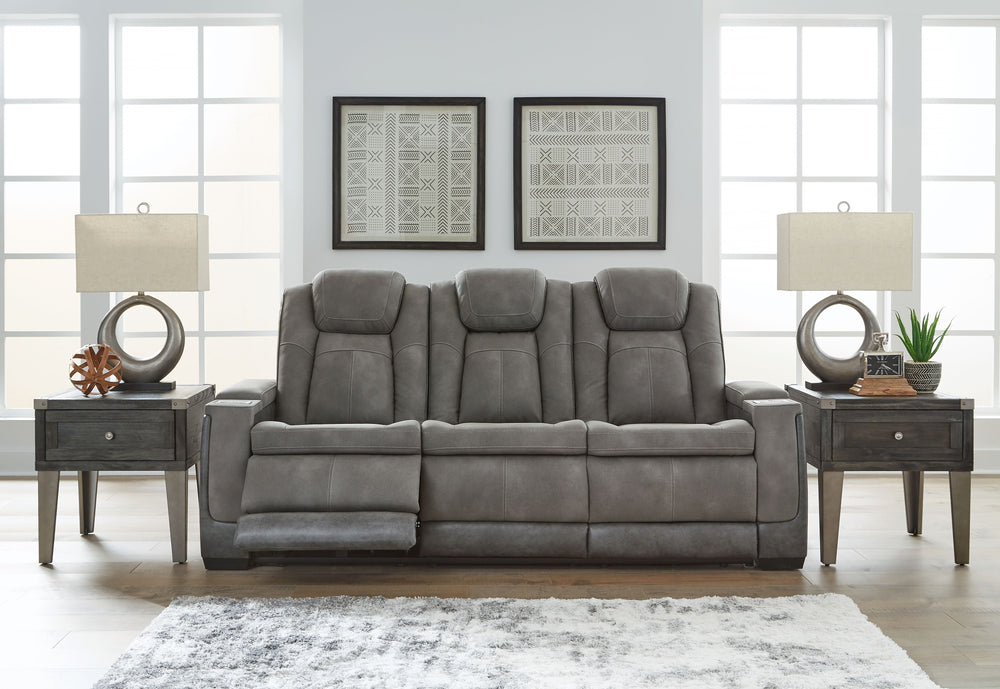 This sleek, ultra-modern power reclining collection has it all. With designer looks and head-to-toe comfort, it has the upscale look of leather at a scaled-down faux leather price. Its gray two-tone upholstery is more durable and water-repellent than regu