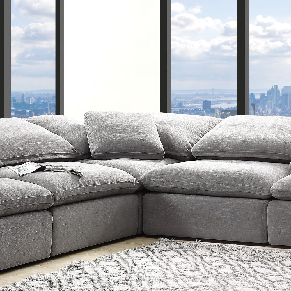 Complete your living room with the unique design and sink-in comfort of the Naveen modular collection. Add both contemporary and modern taste with this beautiful group wrapped in a relaxing hue fabric. This group comes with multiple seating options of wed