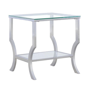 Add a modern touch to your space with this sleek rectangular end table. It features a clear tempered glass top and a matching lower shelf for storage or display. The curved legs and open design bring a light, contemporary feel, while the electroplated pol