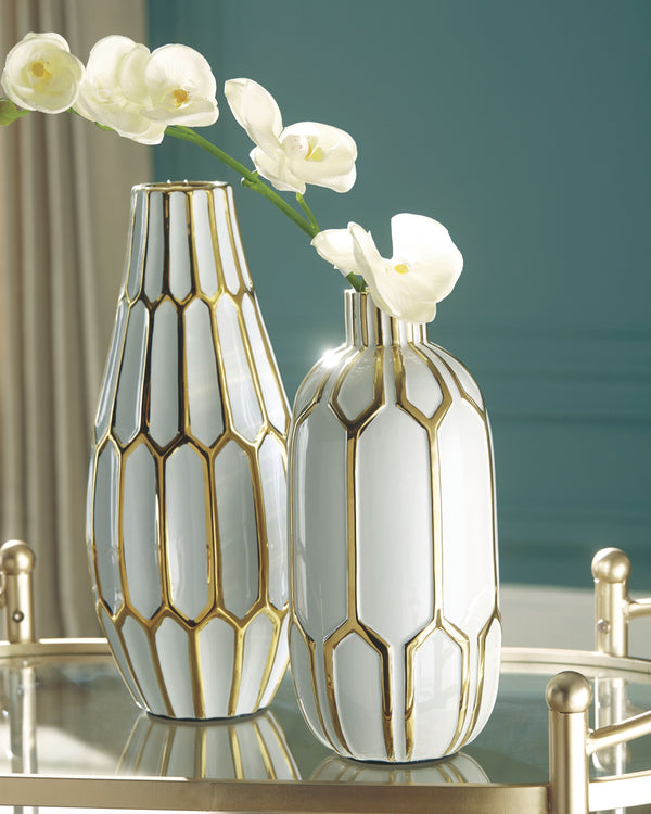  this 2-piece vase set is what your homeâ€™s been missing. Varying sizes in the honeycomb-inspired geometric pattern bring visual appeal. These vases arenâ€™t just good for looks