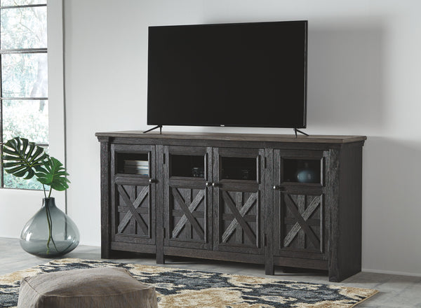  this TV stand appeals to todayâ€™s more relaxed sensibilities. Its richly rustic two-tone effect blends a textured black finish with a weathered gray-brown top for an easy-elegant aesthetic. Framed doors with 