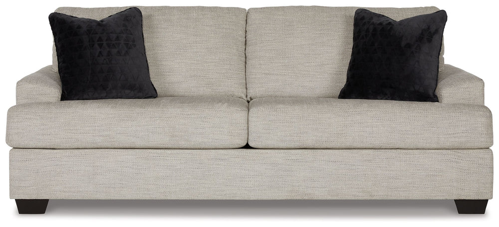 Laid-back luxury meets neutral practicality in this sofa. Taking its cues from contemporary design, the clean-lined piece is outfitted with angular arms for a layer of geometric expression. Softly upholstered, sizable cushions keep you comfortable, while 