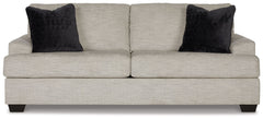 Laid-back luxury meets neutral practicality in this sofa. Taking its cues from contemporary design, the clean-lined piece is outfitted with angular arms for a layer of geometric expression. Softly upholstered, sizable cushions keep you comfortable, while 