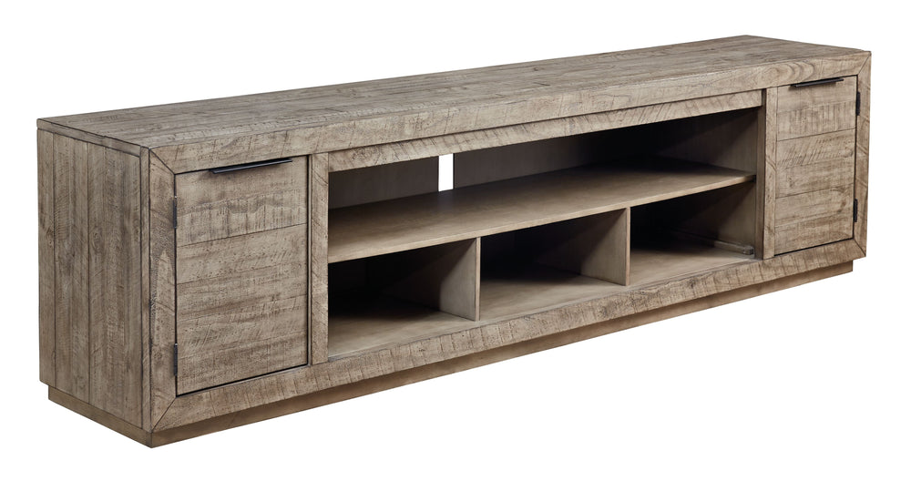This extra-large TV stand is sure to win your heart with its daring take on modern rustic expression. Its crisp, clean minimalist-chic profile is enriched with striking pine wood grain and a weathered gray finish with distressed saw mark texture. Designed