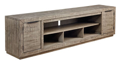 This extra-large TV stand is sure to win your heart with its daring take on modern rustic expression. Its crisp, clean minimalist-chic profile is enriched with striking pine wood grain and a weathered gray finish with distressed saw mark texture. Designed
