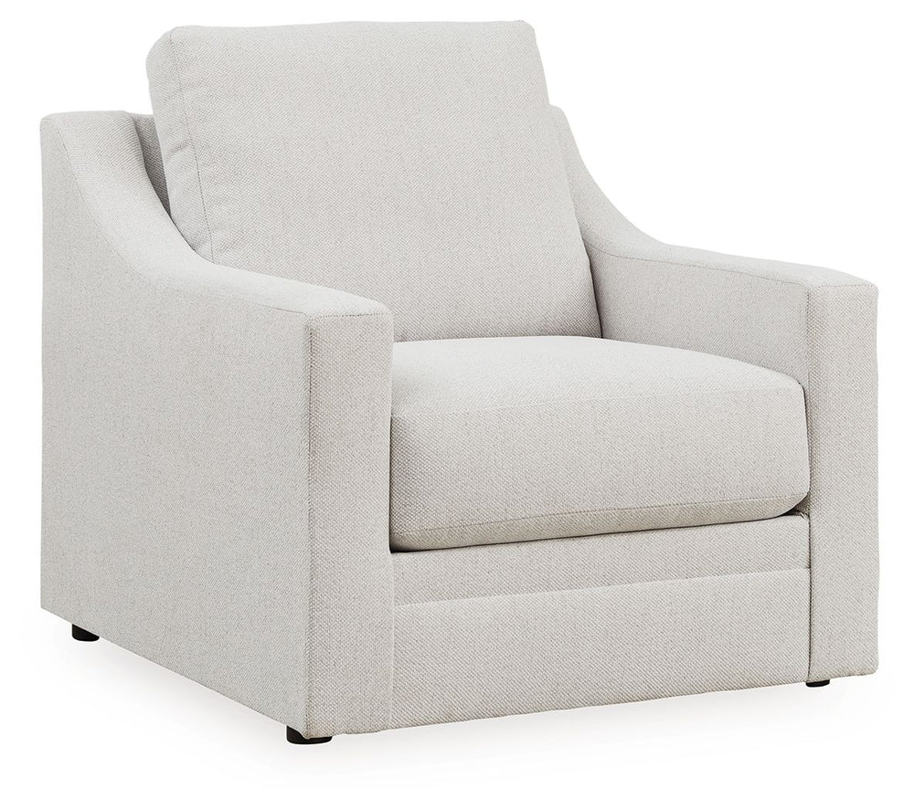 Clean lines and a streamlined silhouette define the architectural attitude of this accent chair. Soft, textured upholstery adds a luxurious high-end touch to the classic design. The chair-'s plush reversible seat cushion and pillowy back beckon you to sit