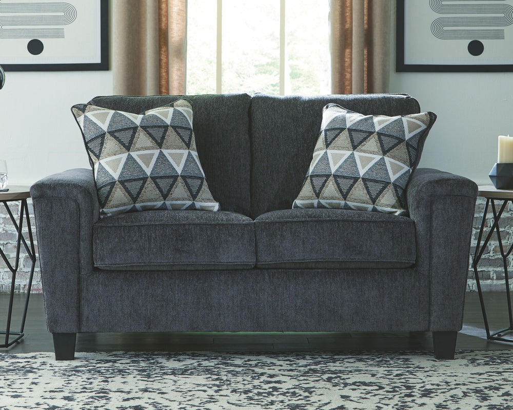 If youâ€™re looking for a smokinâ€™ hot look priced to entice, youâ€™re sure to find this space-conscious, budget-conscious loveseat beautifully fits the bill. Covered in a smoke gray chenille upholstery loaded with plush texture, this less-is-more contem