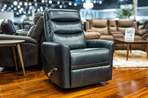  a sleek and contemporary addition to your living space. Equipped with an adjustable headrest and swivel base